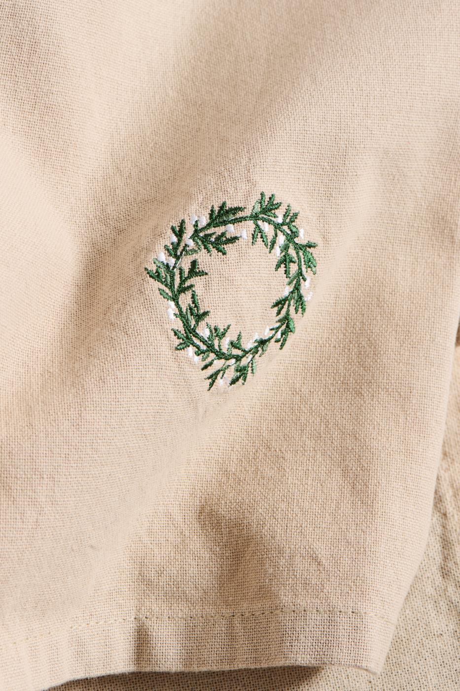 Stoffserviette Tradition mit Kranz leinenfarbig